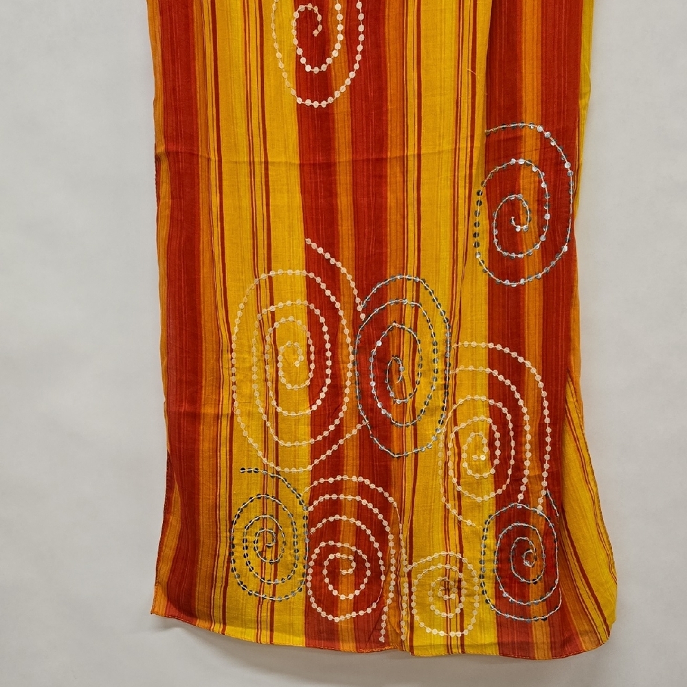 LAILA Rowe Vibrant Yellow, Red and Orange Swirl Scarf With Sequin Swirls.